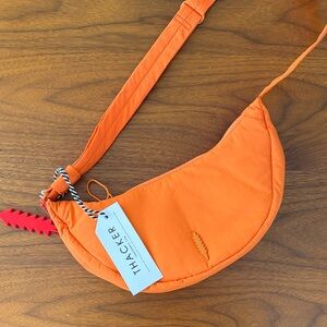 Thacker Orange Crescent Crossbody Bag